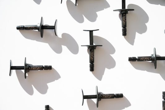 What's Actually in the Applicator: Exosomes, Peptides, and Growth Factors Explained